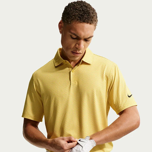 Man wearing yellow polo.