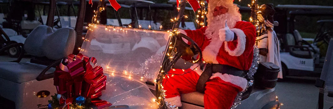 Santa in a golf court.