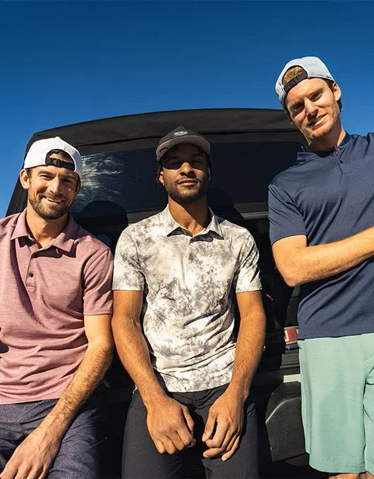 Men wearing VRST golf apparel.