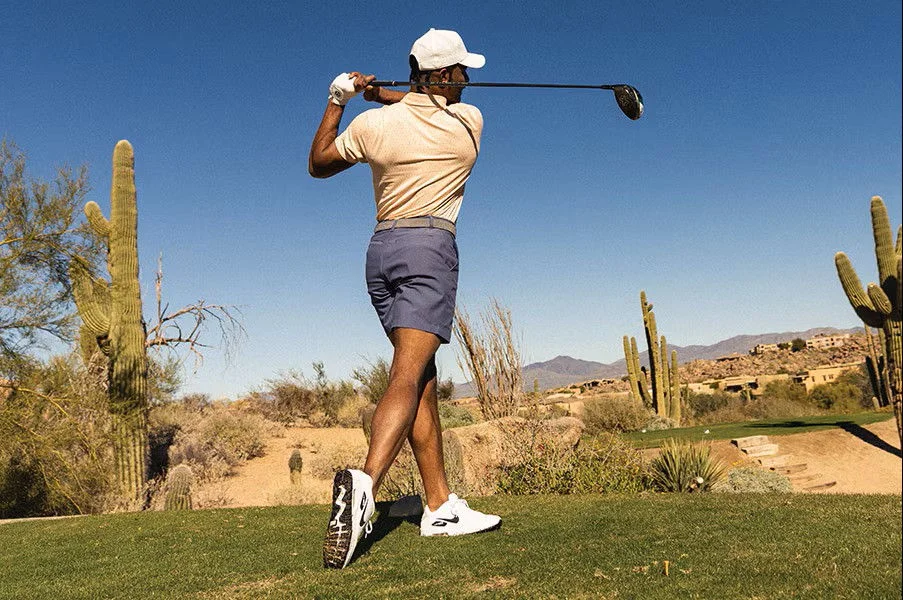 A man golfing.