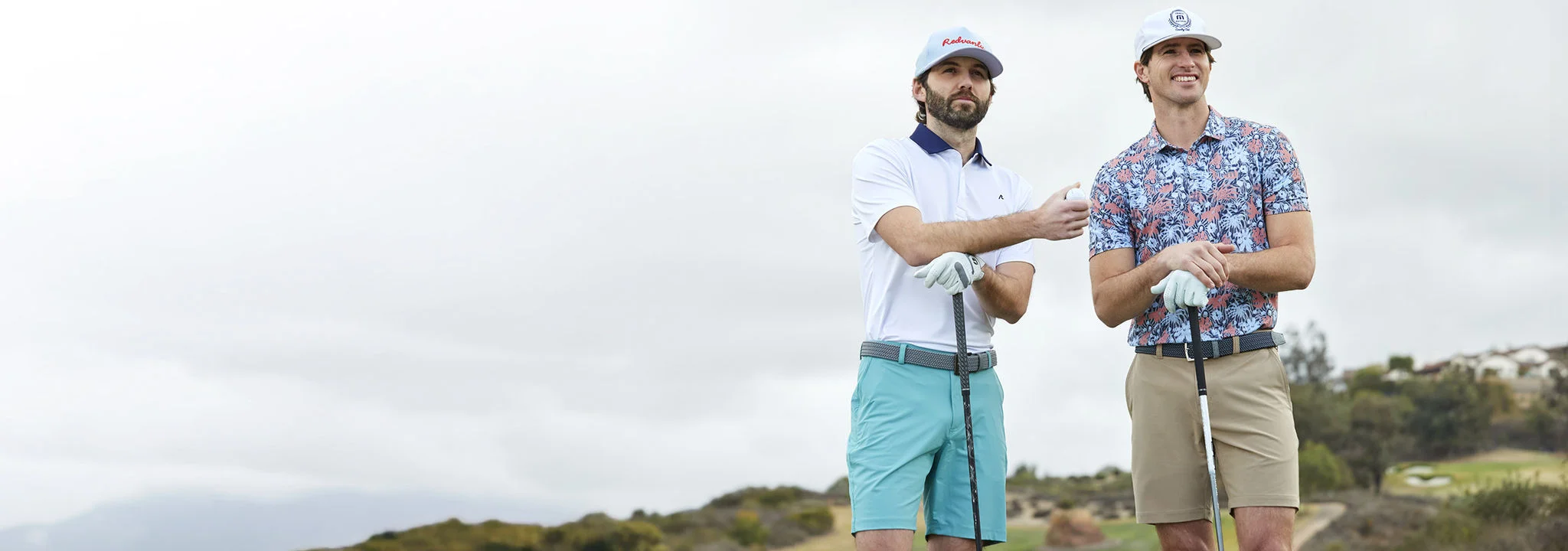 Two men on a golf course.
