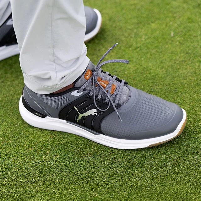 Grey Puma shoes.