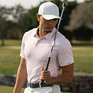A man wearing a VRST golf polo.