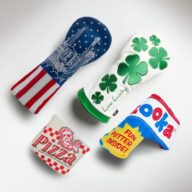 Collection of golf head covers.