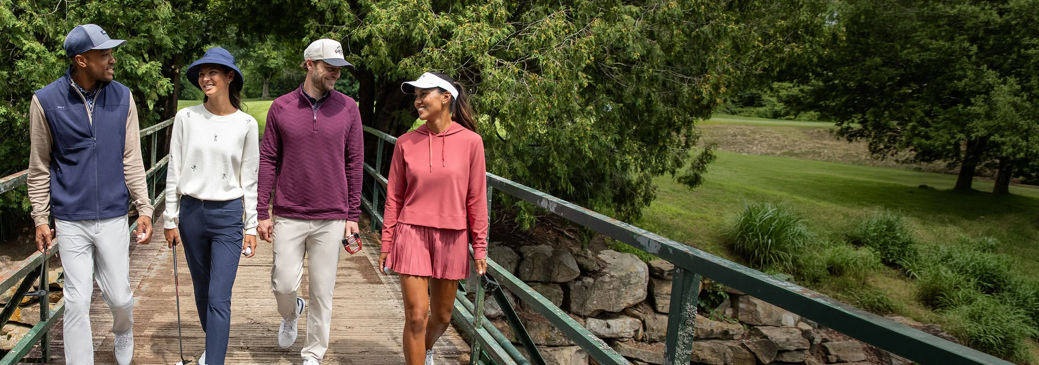 People in fall golf attire.