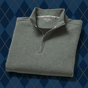 A laydown shot of golf gifts for men.