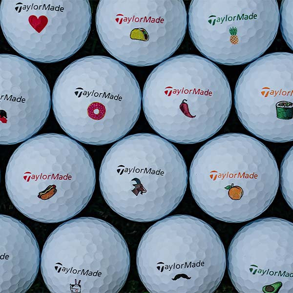 TaylorMade golf balls with custom icons.