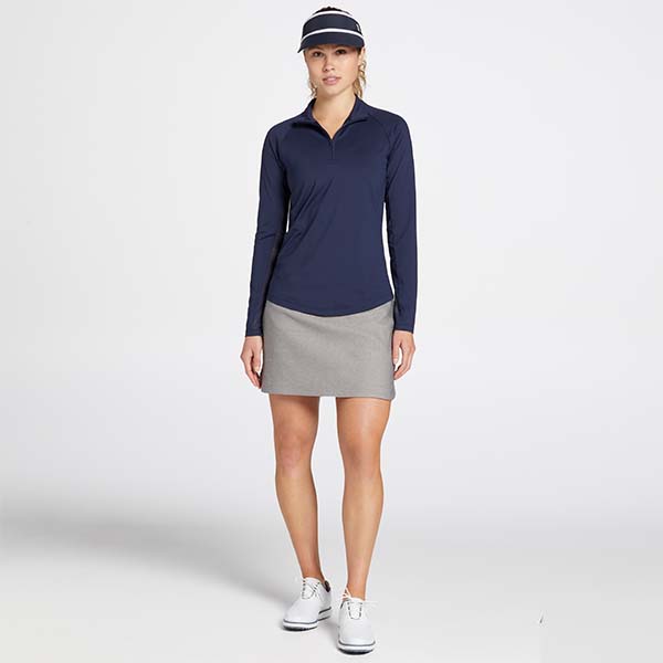 Model in studio wearing pullover.