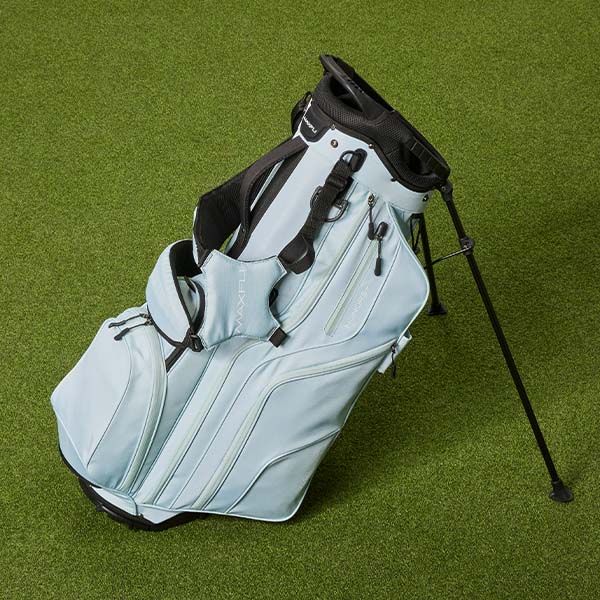 Maxfli bag leaning on grass.