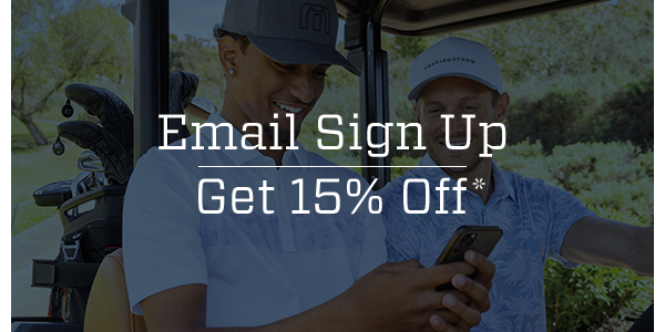 A golfer looking at an email on his phone.